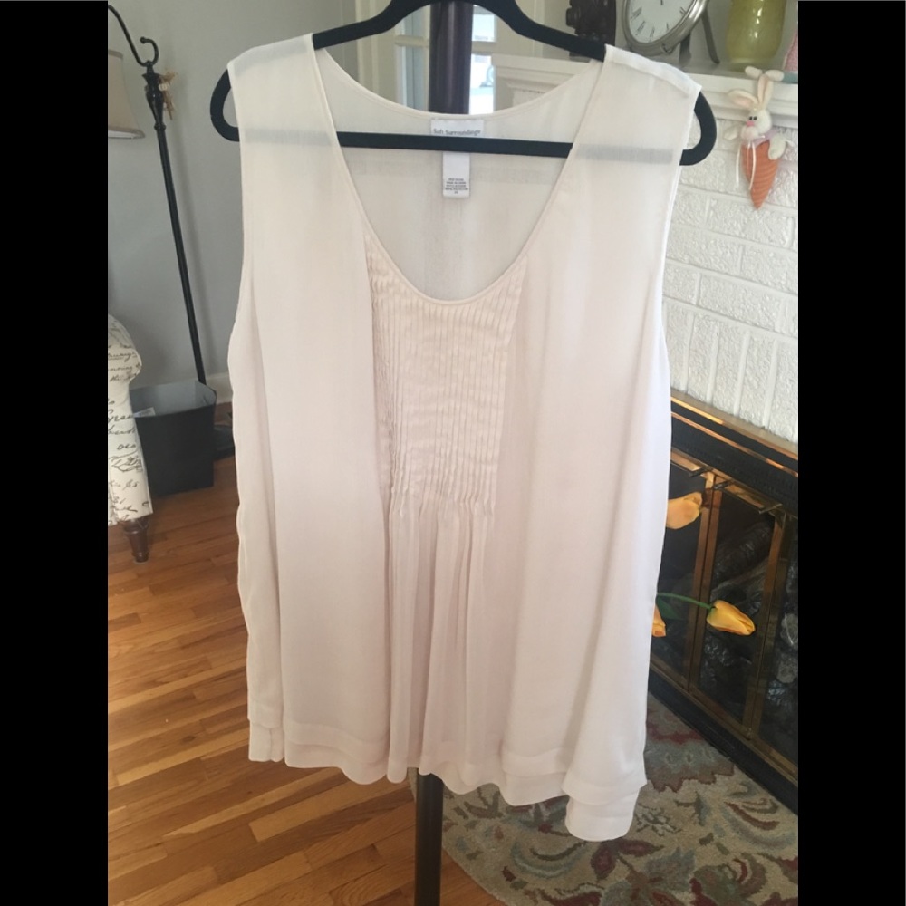 Cream sleeveless tiered blouse w/ smocking detail